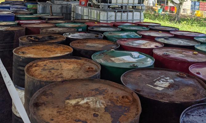 Main image: Stockpile of used oil containers at the Samoa Recycling and Waste Management Association compound.